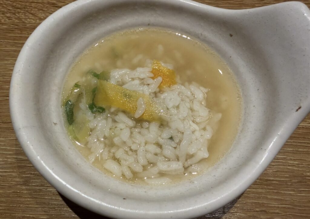 北の味紀行と地酒 北海道のしゃぶしゃぶの出汁で作った〆の雑炊。